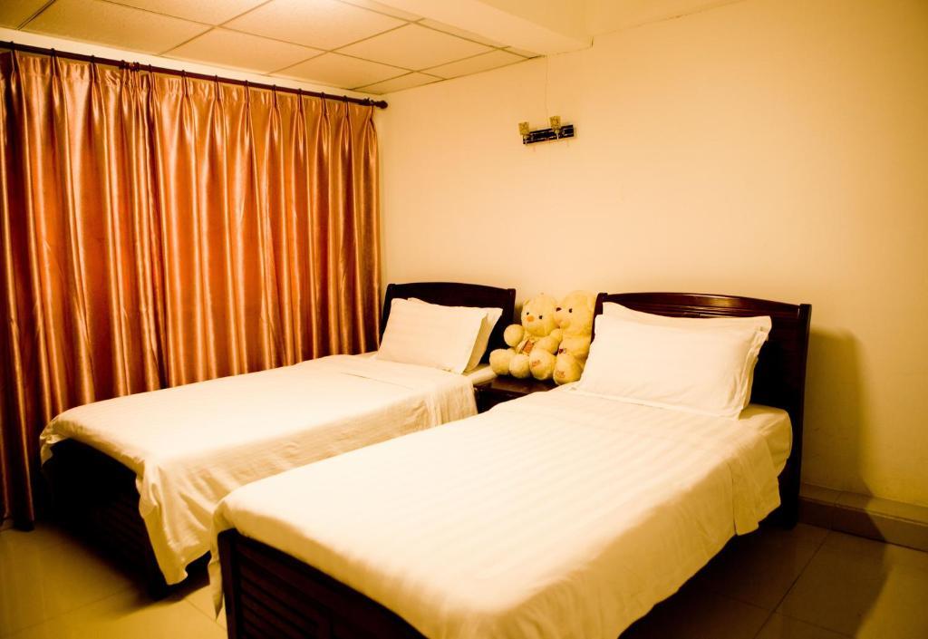 Sanya Hairulan Hotel Rum bild